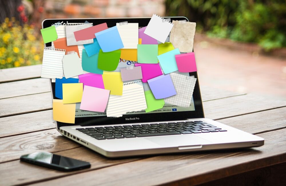 Postit notes on laptop