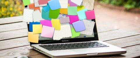 Postit notes on laptop
